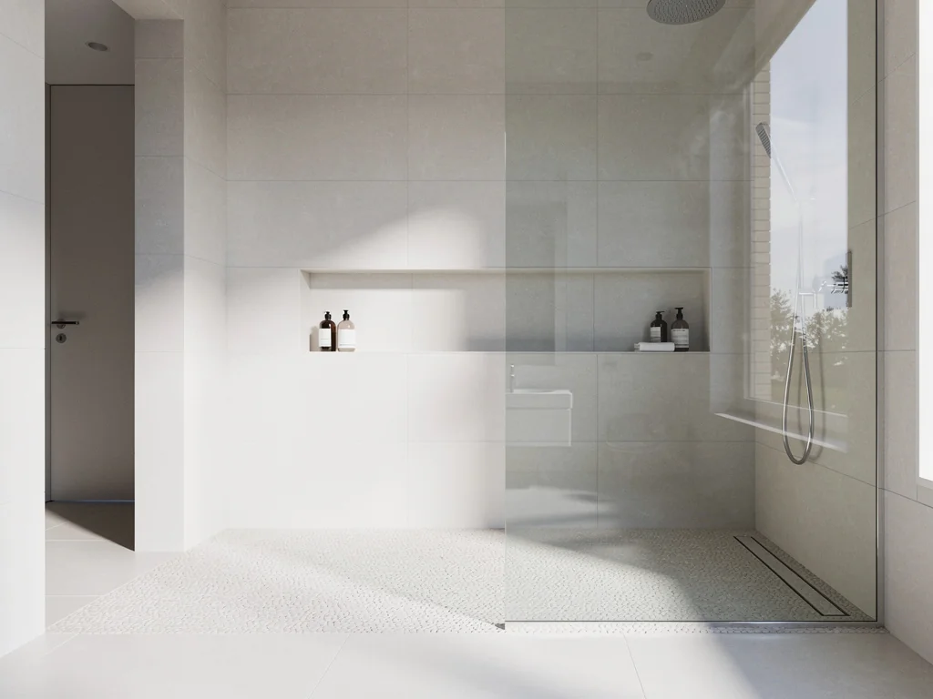 Douche à l'italienne accessible avec sol antidérapant et large paroi vitrée